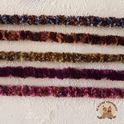 Chenilleband donkerkleurig 6 mm.